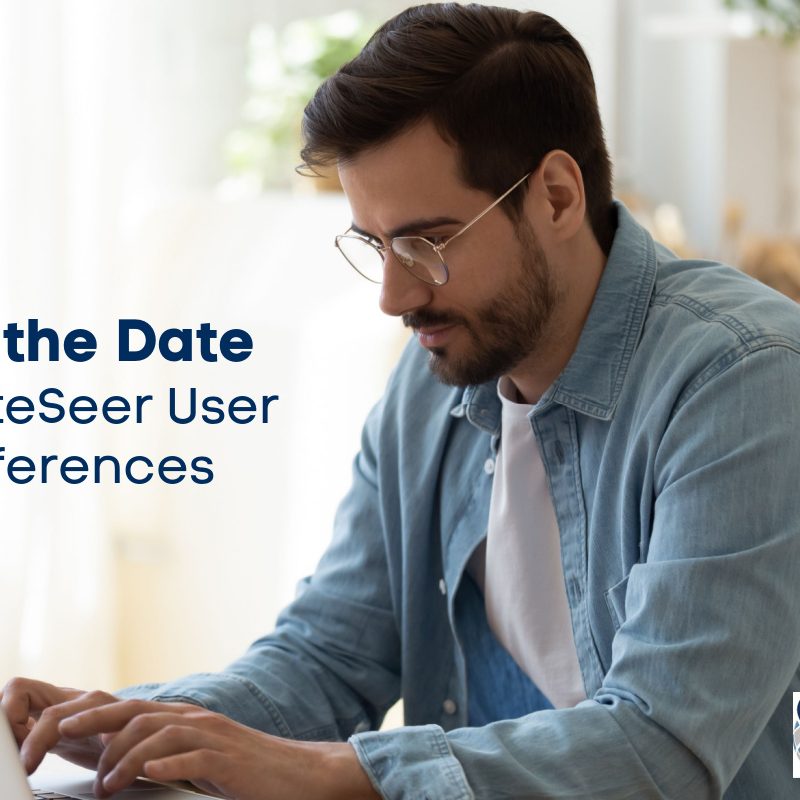 Man in glasses and denim shirt using a laptop at a table in a bright room. Text on the image announces Save the Date: 2023 SiteSeer User Conferences. SiteSeer logo is in the bottom right corner.
