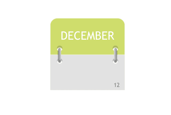 Illustration of a desktop calendar showing the month of December. The top half is green with December in white text, and the bottom half is gray with the number 12 in the lower right corner. The pages are held by metal rings.