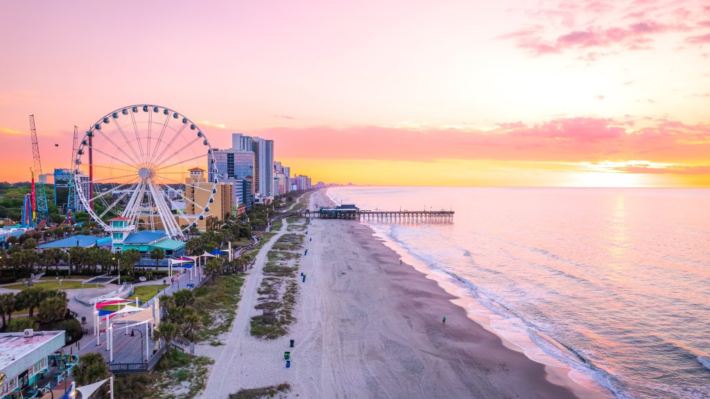 Image showing beach and Ferris wheel at sunset